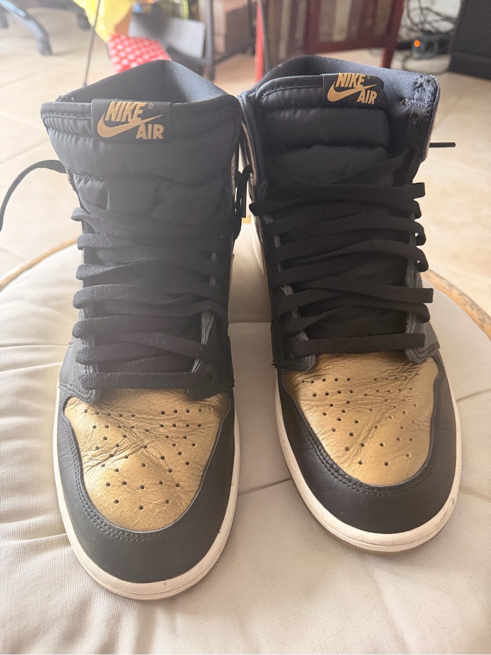 Nike High-Top Sneakers in Black and Gold
